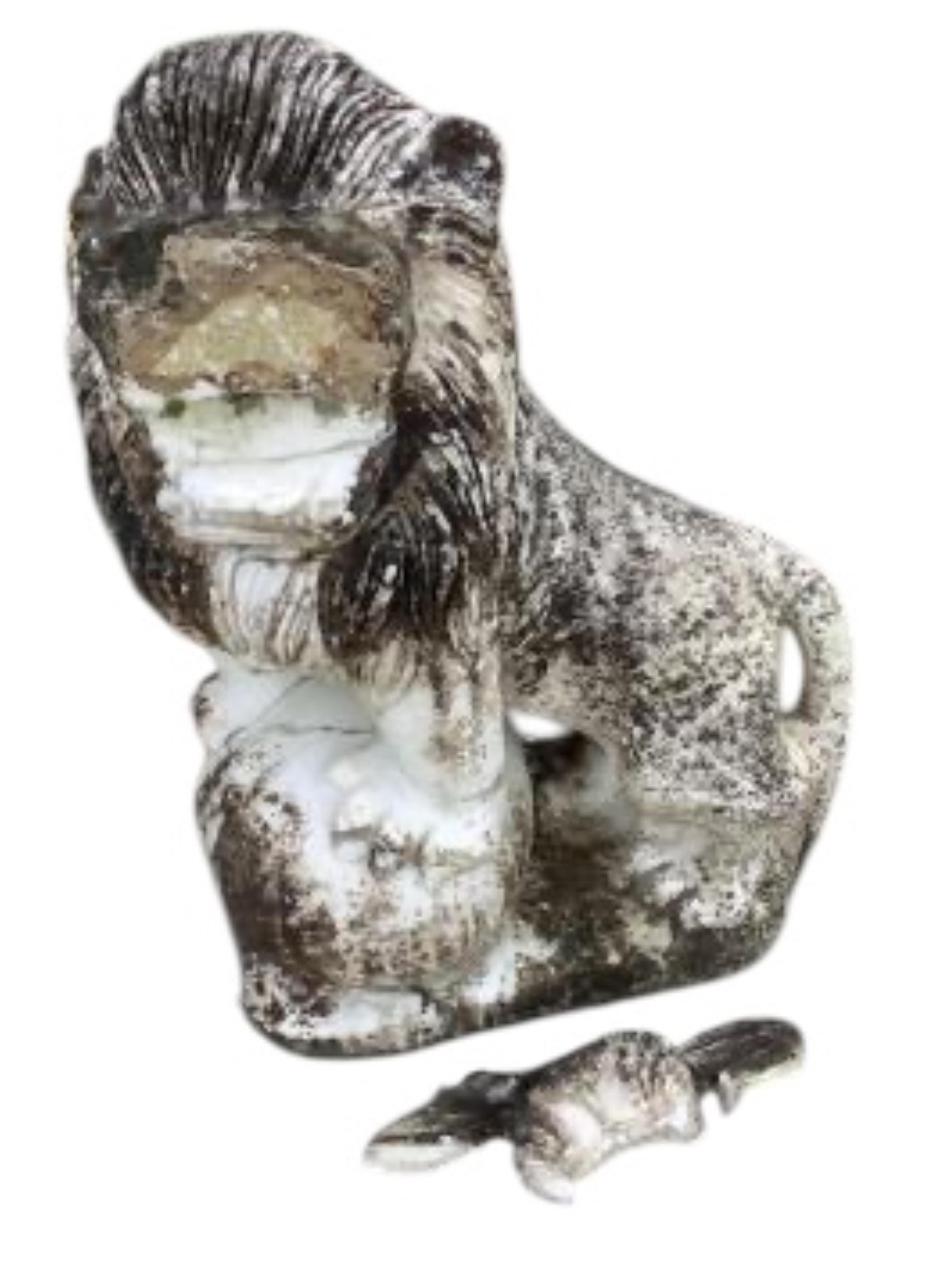 A pair of Chinese style reconstituted white marble models of kylin, (one in need of repair), height 71cm